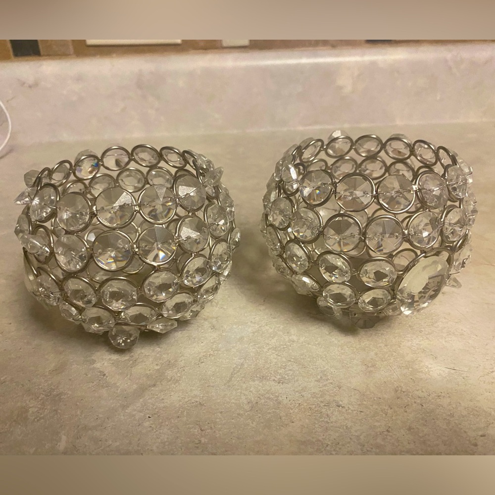 Two piece glass pieces with fake crystals attached.